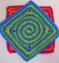 http://www.ravelry.com/patterns/library/squaring-the-spiral-dishcloth