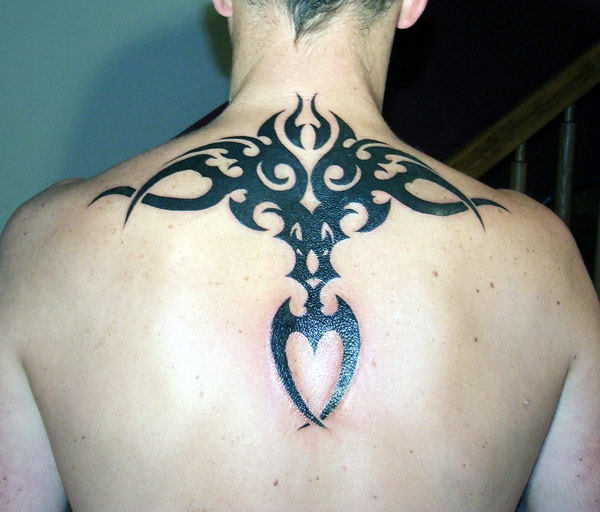 This tattoo design is really awesome ideal cross shaped tribal tattoos design