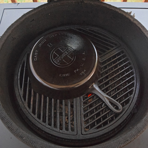 Seasoning cast-iron cookware on a Big Green Egg