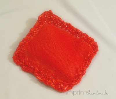 Plastic grocery mesh bag scrubbies