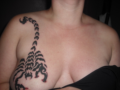 shoulder scorpion tribal tattoo