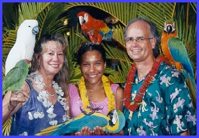 Emmy Raver Lampman with her mother and father