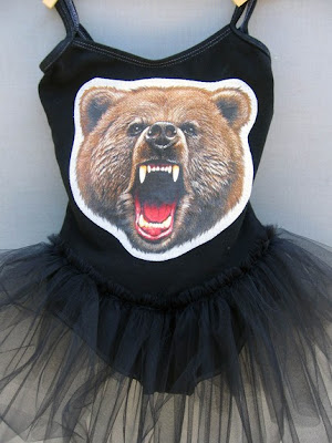 No leotard would be complete without a ferocious grizzly bear applique