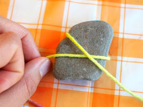 lovely yarn wrapped rocks to make with kids