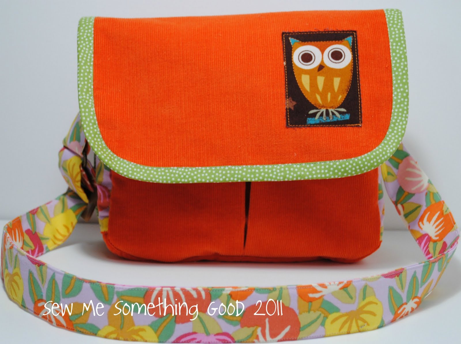 added the inset zippered pocket to the bag's back, once again, along ...