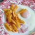 Tampantojo de  Huevos fritos con papas fritas.