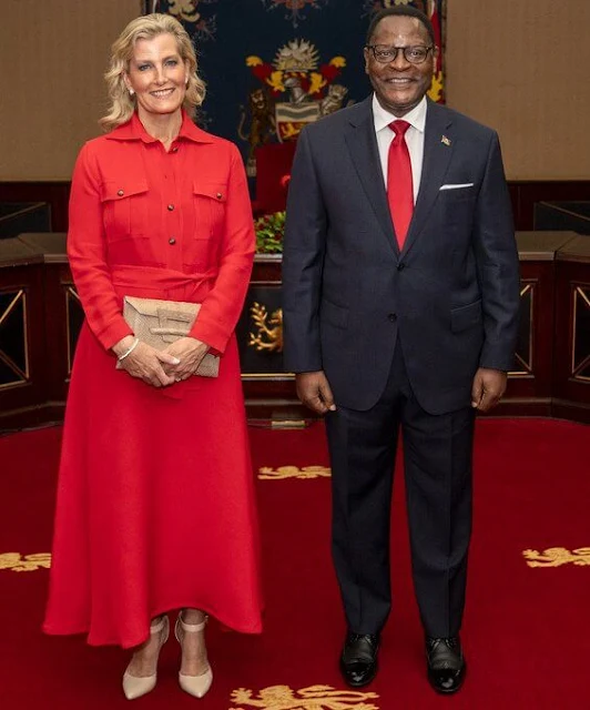 The Countess wore a red wool and silk blend dora dress by Giuliva Heritage. Moda in Pelle beige ankle strap pumps