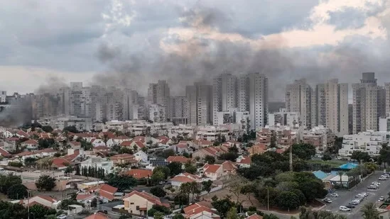 Cover Image Attribute: Smoke rises after a rocket fired from the Gaza Strip hit a house in Ashkelon, southern Israel, Saturday, October 7, 2023. / Source: AP