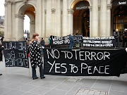 . we took to the streets of Melbourne, members of Women in Black, .