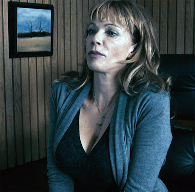 redhead Lauren Holly showing some delicious mature cleavage from the