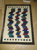 http://kristaquilts.blogspot.ca/2016/02/a-finish-and-choices.html