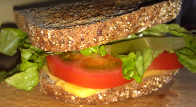 How good does this toasted tomato sandwich look? It is so easy and a great quick lunch staple. Cheddar cheese, tomato, lettuce, pickle, mustard, mayo, Dijon mustard. yum.