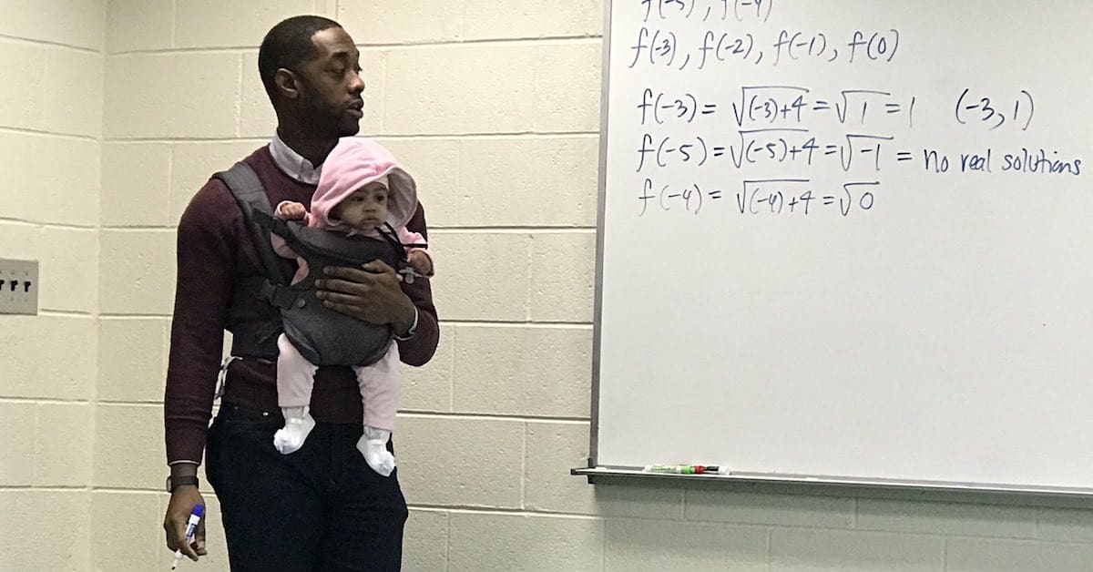 An Amazing Math Professor Teaches While Holding His Student's Baby, As She Couldn't Find A Babysitter