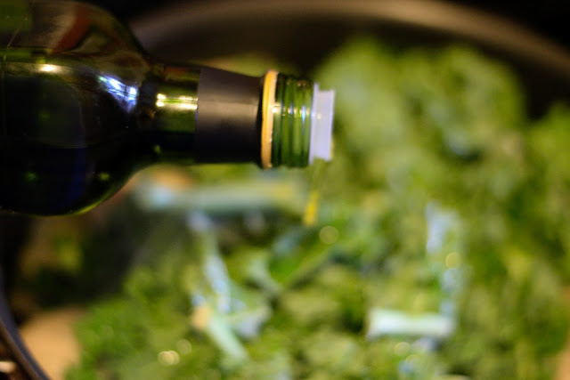 Extra virgin olive oil being added to the pan. 