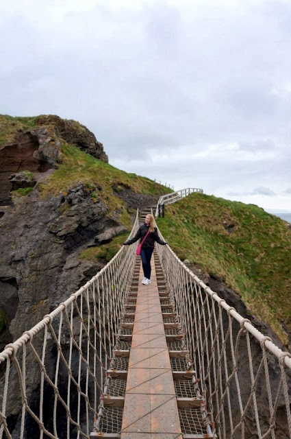 Carrick-a-Rede rope bridge Antrim Northern Ireland Coastal Island Fishing mainland Carrickarede tourist springtime suspended bridge