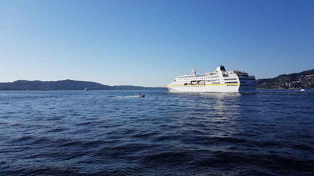 Cruise ship MS Hamburg departing a sunny Bergen, Norway