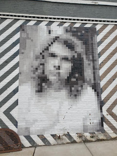 mural of a blurry woman