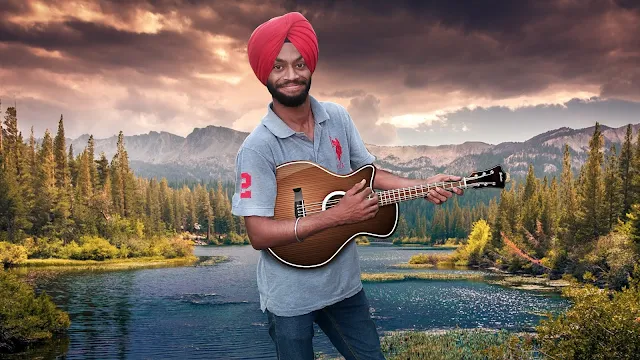 Harman Singh Bansal holding guitar