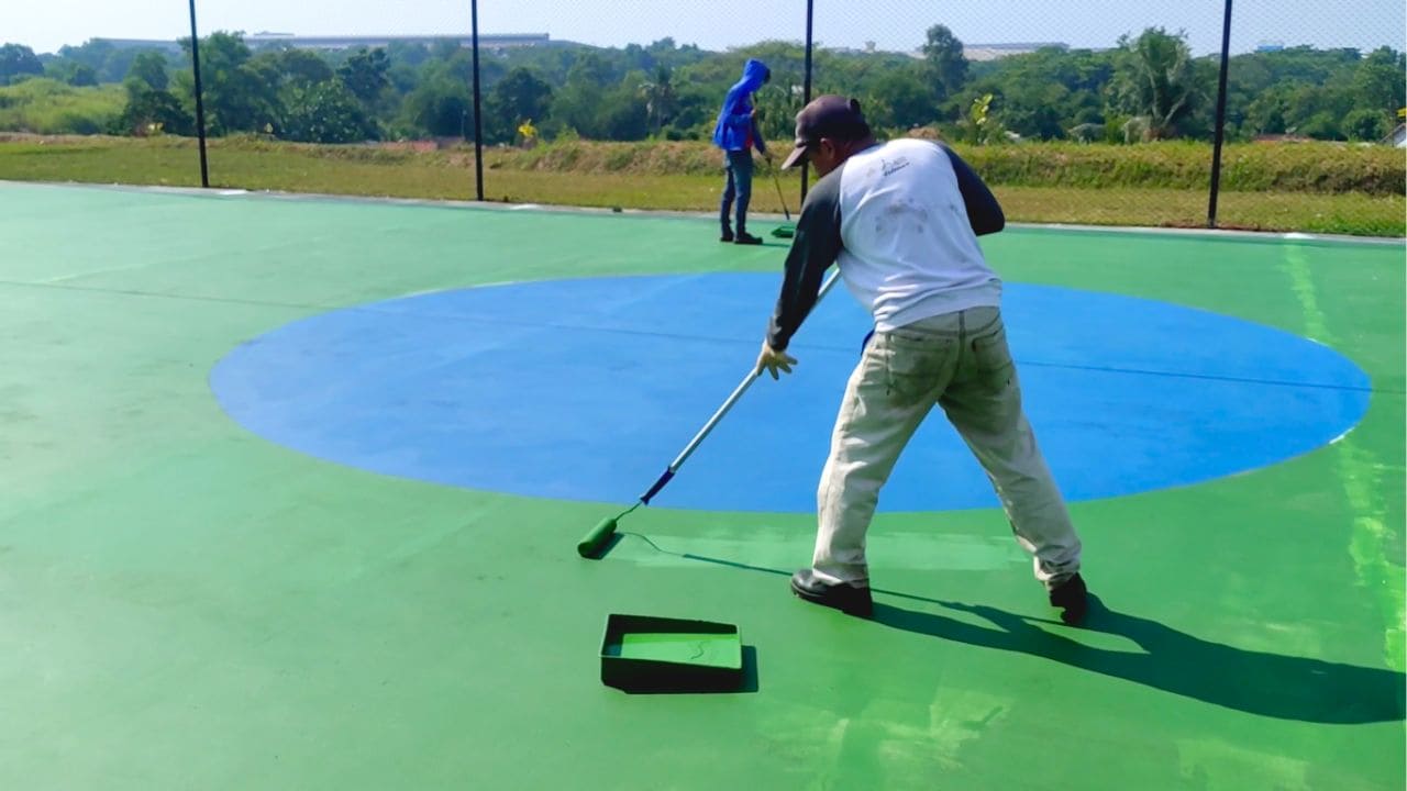 Proses Pengecatan Lapangan Futsal