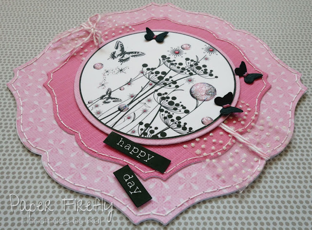 Black and pink card with floral silhouette image