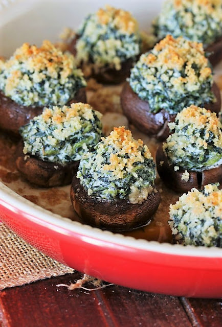 Spinach Dip Stuffed Mushrooms in Baking Dish Image