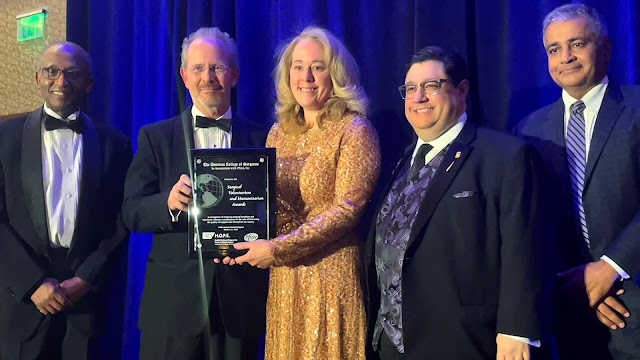 Air Force Col. (Dr.) Kerry P. Latham accepted the ACS/Pfizer Military Surgical Volunteerism Award during the annual ACS Clinical Congress in Boston, Oct. 22-26, 2023. (Photo courtesy of Army Col. Danielle Holt)