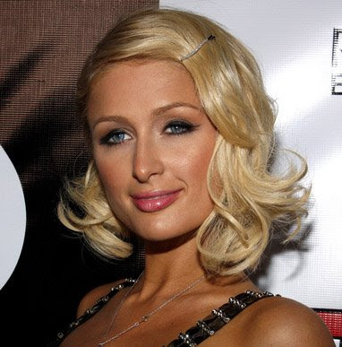 Paris Hilton Medium Curly Hair style With Blonde Hair Color 