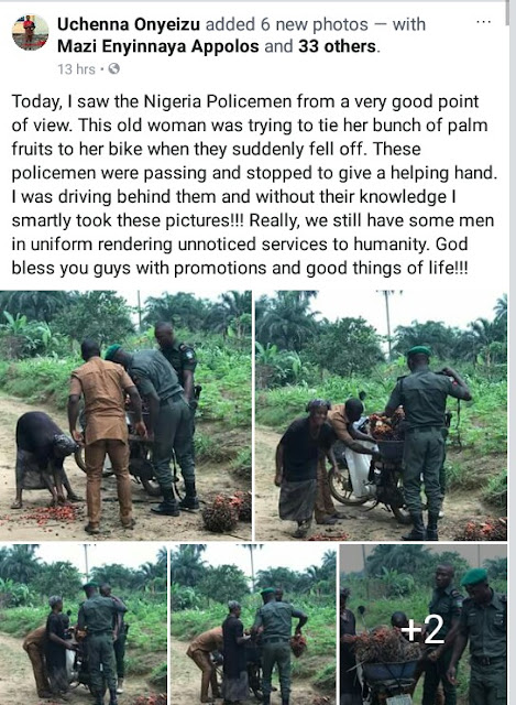  Heartwarming photos of Nigerian policemen helping an old woman tie her palm fruit bunches to a bike after they fell of