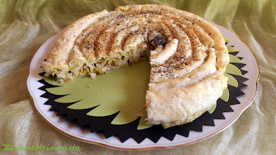 Girella di sfoglia ripiena salata - Torta salata a spirale