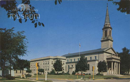  view of Immaculate Conception Church rectory and school circa 1974