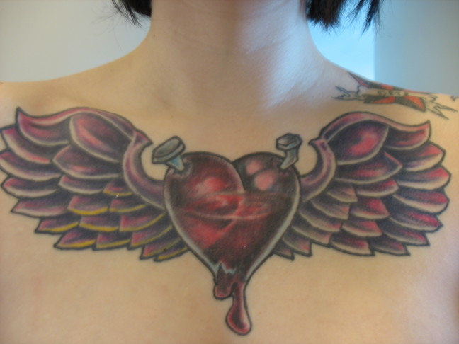 heart with wings tattoos. Heart With Wings Tattoo