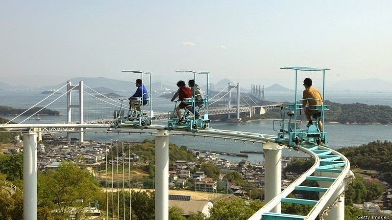 At the Washuzan Highland Amusement Park in Okayama, Japan, you will find the SkyCycle, a roller coaster in which passengers are required to pedal a course four stories high. - Japan’s Pedal Powered Roller Coaster Is The Most Unintentionally Terrifying Ride Ever.