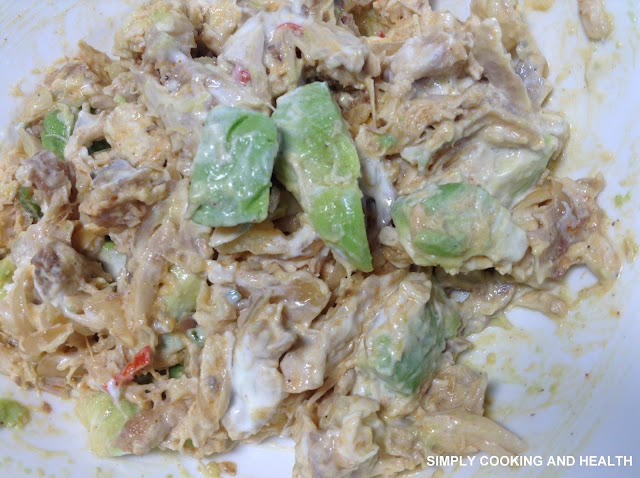 Mixture of  chicken, avocado, potato, yogurt, green chili, red chili, pepper powder and salt.