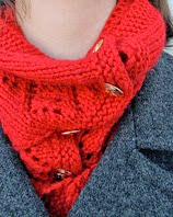 http://www.ravelry.com/patterns/library/diamond-buttoned-neckwarmer