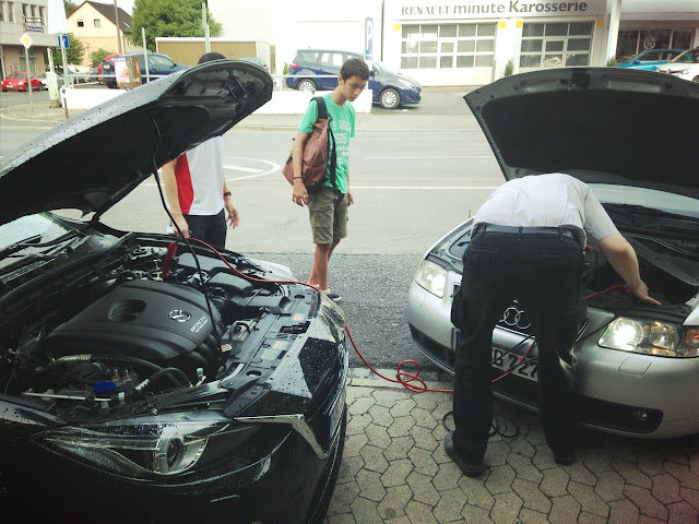 Car battery down in Germany, locals helping to recharge car battery