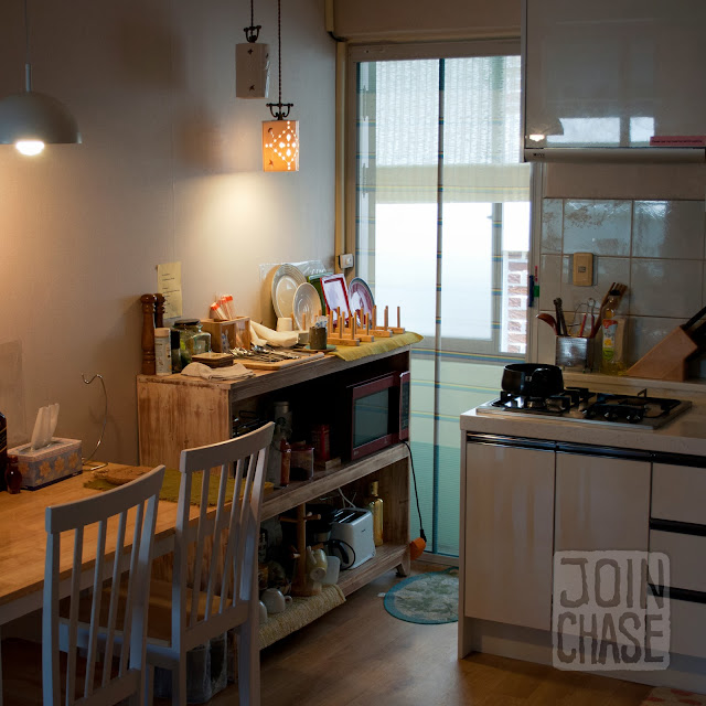 A kitchen and small table in Pedro's House in Gwangju, South Korea.