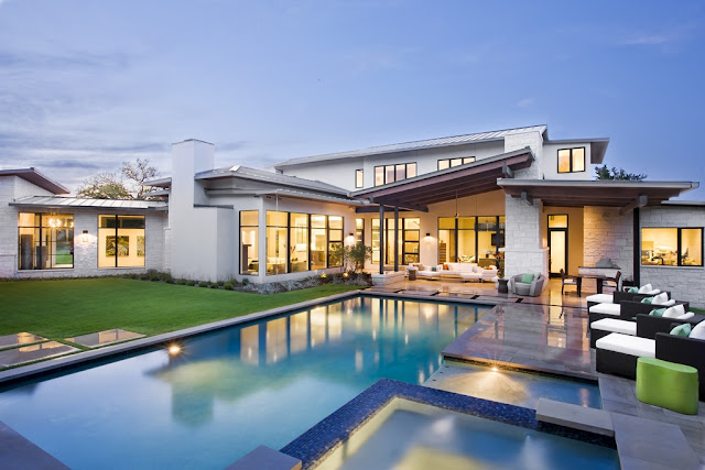 Photo of urban contemporary home as sen from the pool area