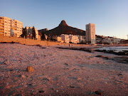 We sat on the beach watching the sun go down. (dsc )