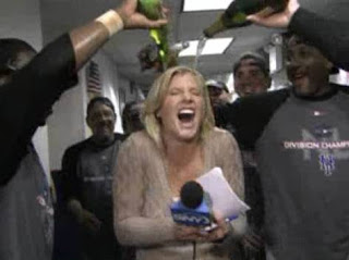 a picture from the famous drenching Julie Donaldson received from the Mets after they clinched the division in 2006