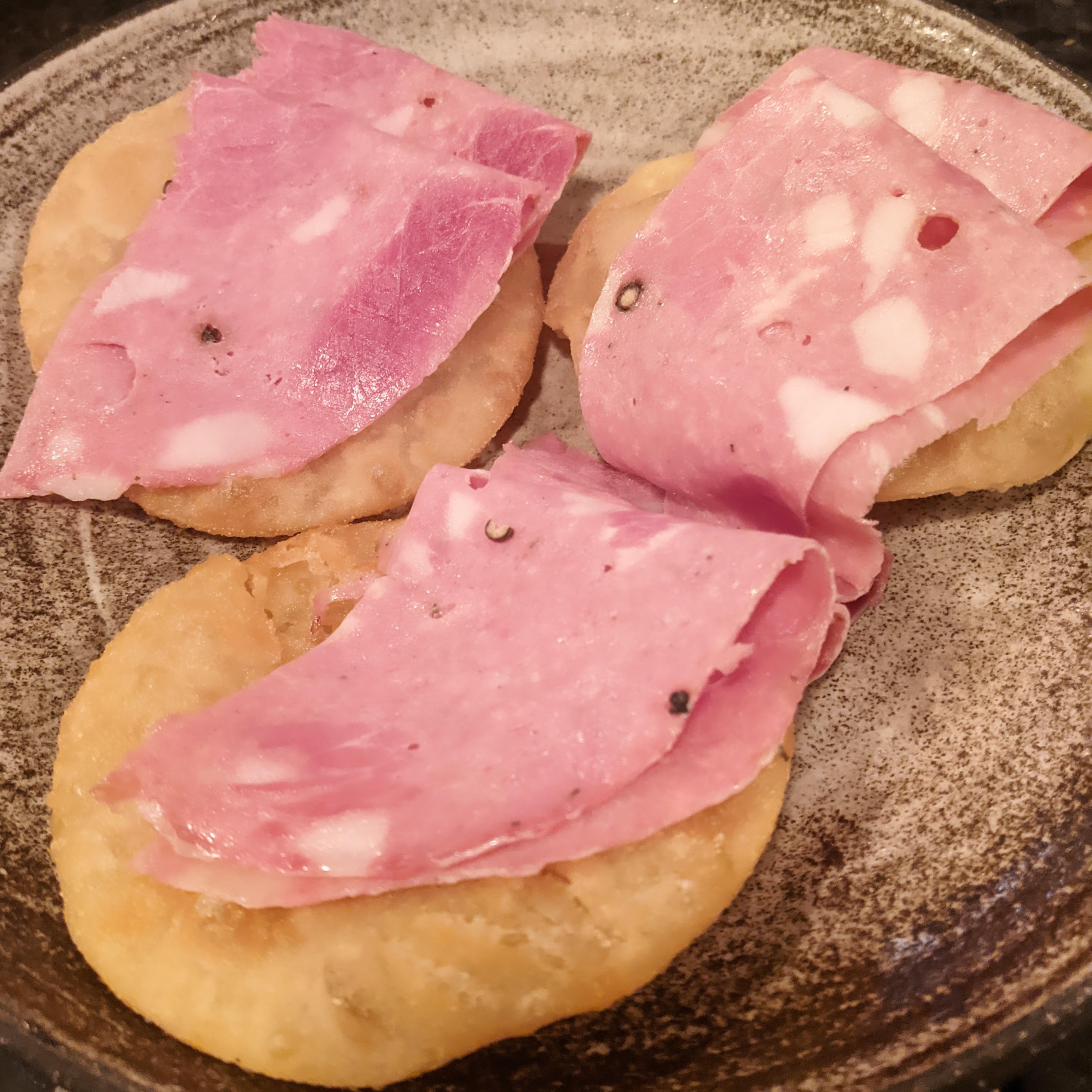 three pieces of mortadella topped gnocco fritto at Ombra, one of london's best and most authentic italian restaurants