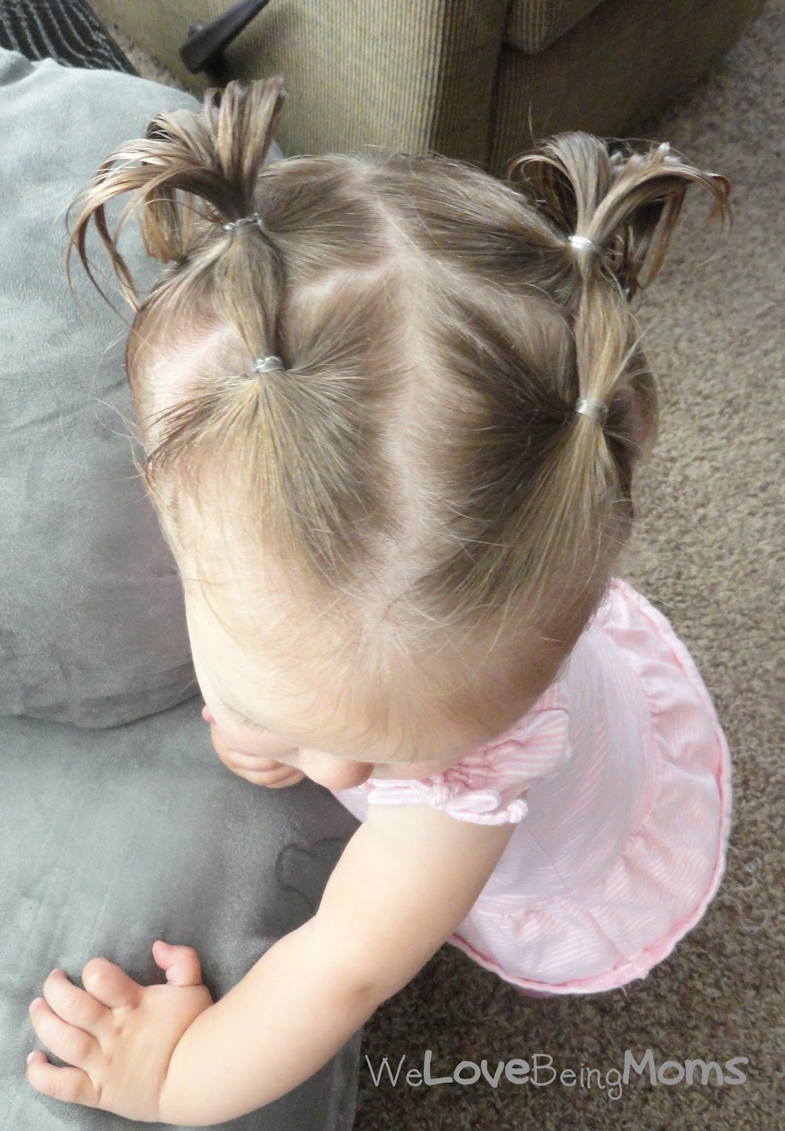 Image of Two pigtails hairstyle for 8 month old