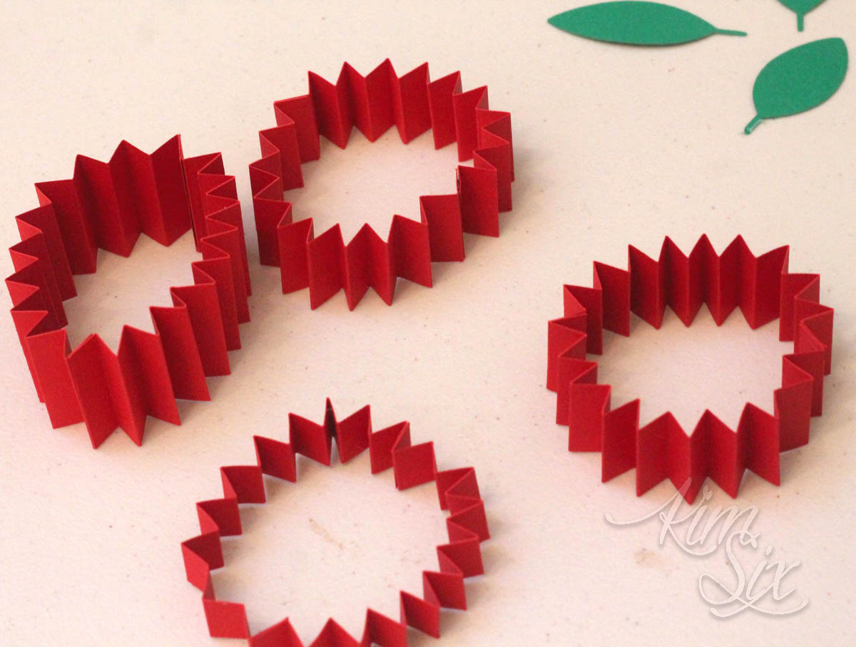 Accordian folded medallions with cricut scoring wheel