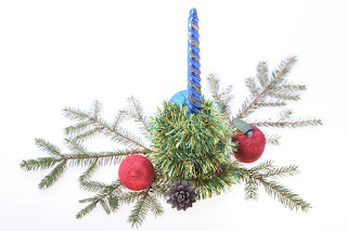 Decorative New Years Eve blue Candle and red Christmas balls