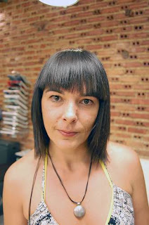 Medium Dark Hairstyle with Blunt Bangs