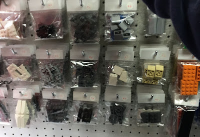 Lots of loose LEGO bricks and minifigs to choose from