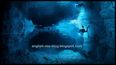 Some portion of this cave is above water , while most of it is underwater.