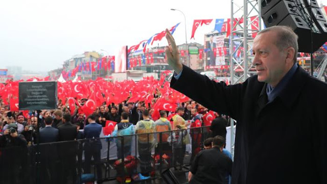 Recep Tayyip Erdogan greets supporters at a ceremony in Istanbul on Sunday