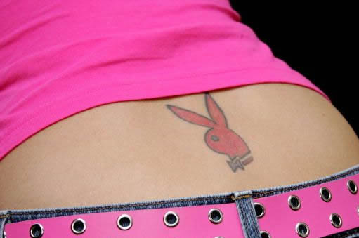 Once upon a time, Holly Madison had a pink playboy bunny tattoo on her lower