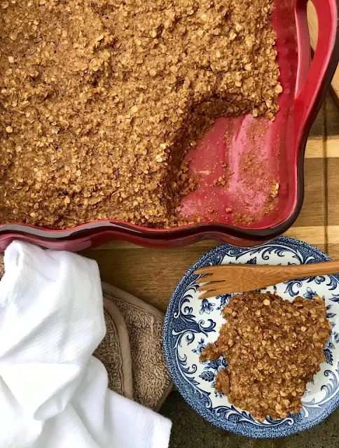 Baking dish of baked gingerbread oatmeal.
