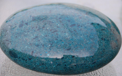 Figure 1 Soil moisture is stored on soil particles like a film via adhesion. On this stone adhesion is demonstrated by dipping it into water solution containing blue dye.